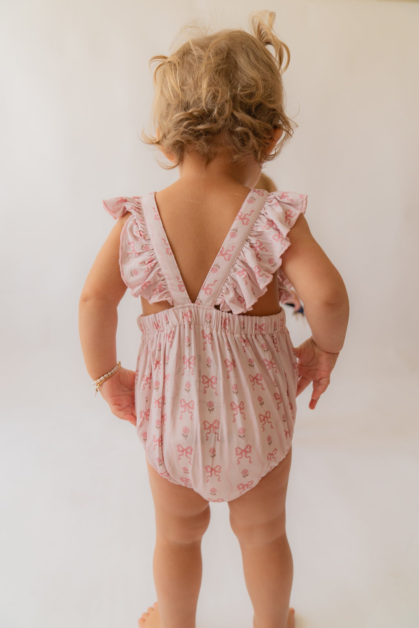 Bow's | Daywear Ruffle Romper